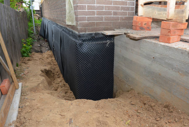 Happy homeowners after waterproofing job in LaGrange